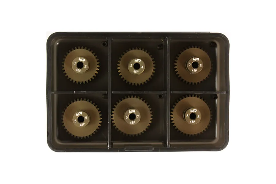 A set of six Yeah Racing hard-coated aluminium pinion gears in a black plastic storage case, labeled 33T to 38T.