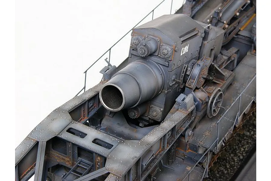 High-angle close-up of a detailed 1/35 scale model of the German Morser Karl self-propelled siege mortar, showing the large barrel and weathered metal finish.