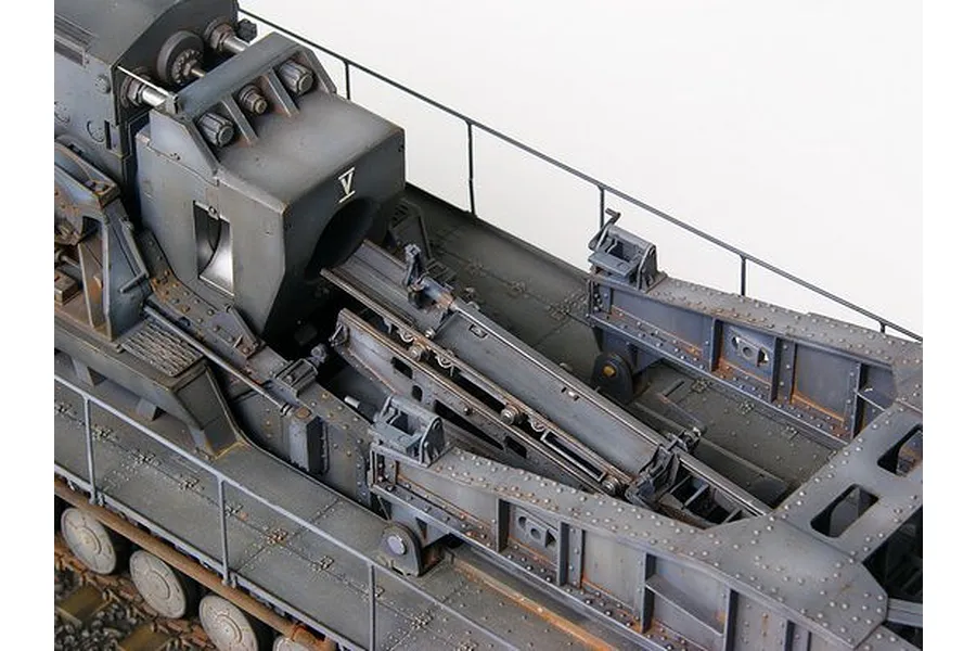 High-angle view of a detailed 1/35 scale model of a German Morser Karl self-propelled siege mortar on a railway transport carrier.