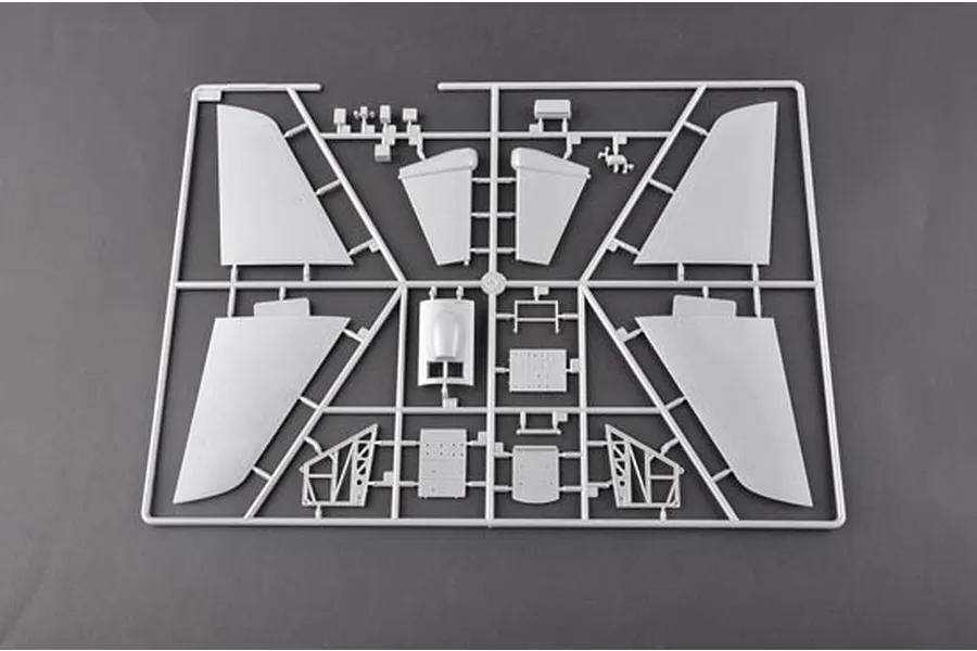 A grey plastic model kit sprue containing various aircraft wing and fuselage components for a 1/32 scale model.
