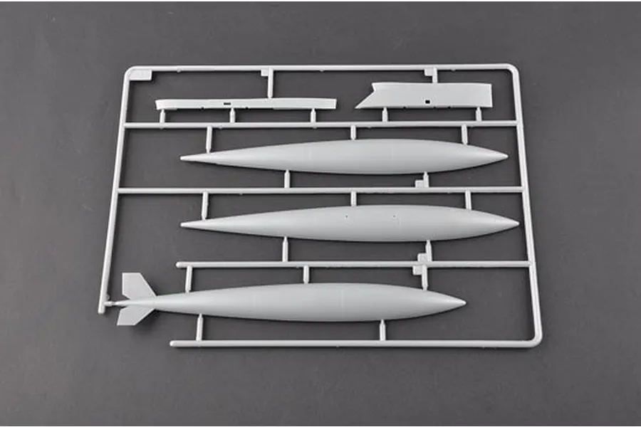 A grey plastic sprue containing model aircraft external fuel tanks and components for a 1/32 scale A-6A Intruder model kit.