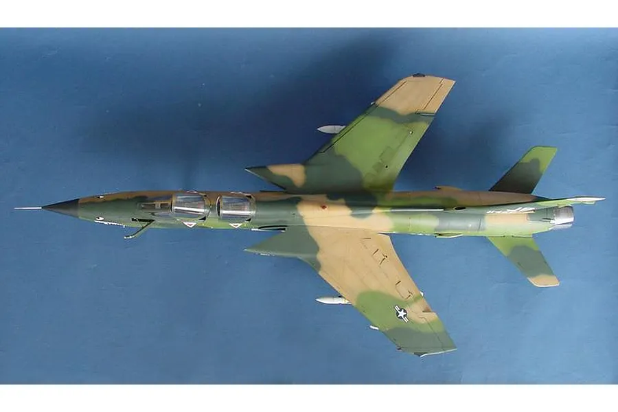 Top-down view of a completed 1/32 scale Republic F-105G Wild Weasel model aircraft with a camouflage paint scheme.