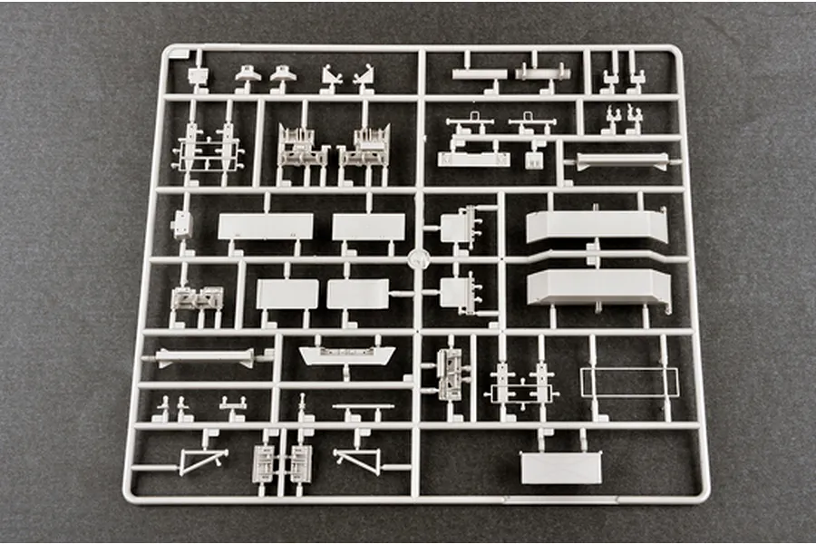 A grey plastic sprue containing various model kit parts for the Trumpeter 1/35 M983 HEMTT &amp; M901 Patriot missile system.