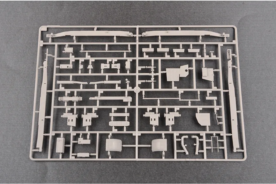 A grey plastic sprue containing various unpainted model kit parts for the Trumpeter 1/35 Russian 9A52-2 Smerch-M Rocket Launcher.