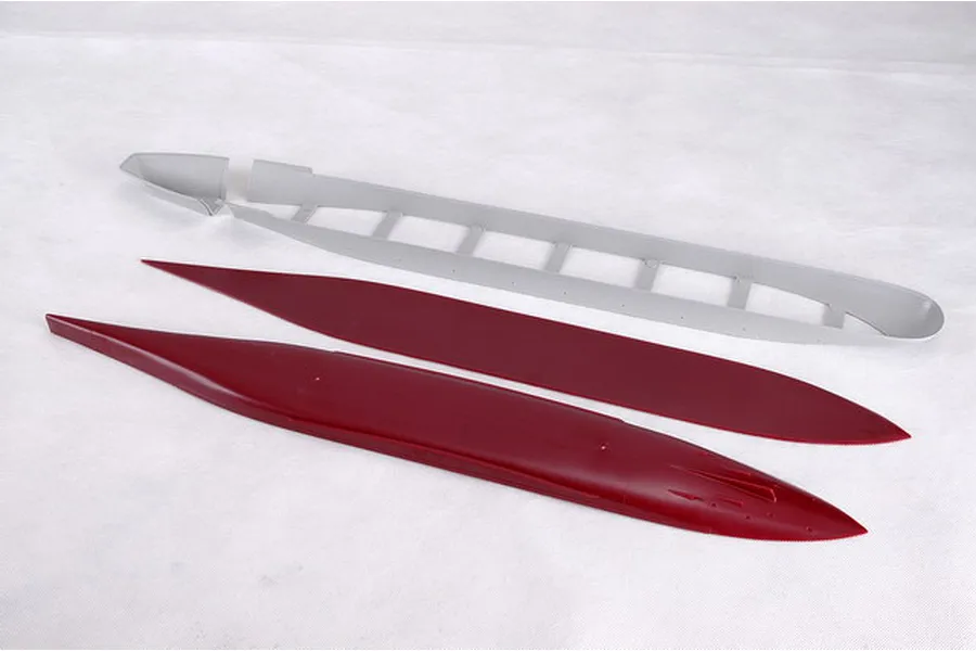 Unassembled plastic model ship hull parts for a 1/350 scale aircraft carrier kit on a white background.