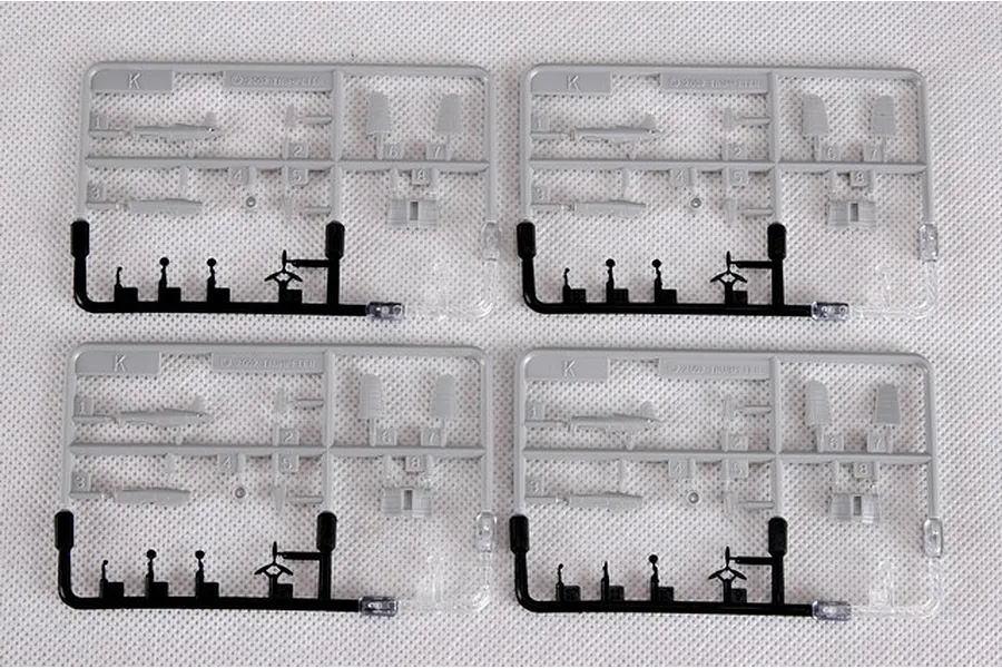 Four identical grey plastic model kit sprues containing aircraft parts for a 1/350 scale model.