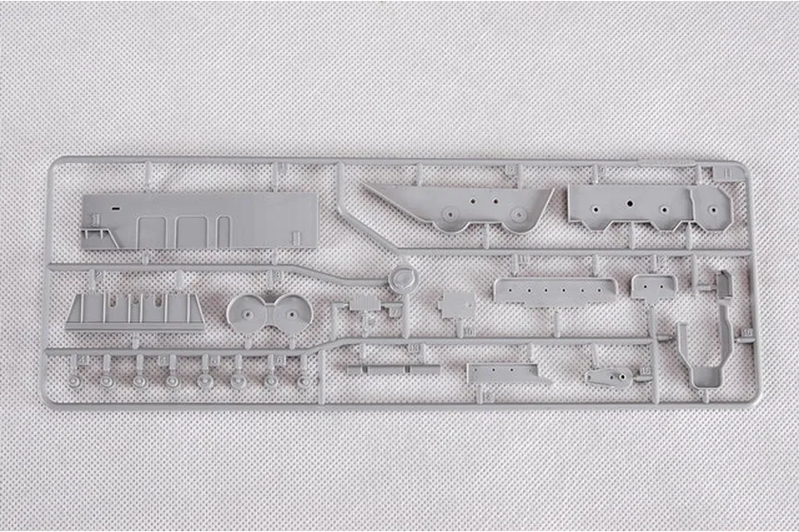 A grey plastic sprue containing various unpainted model parts for a 1/350 scale ship kit.