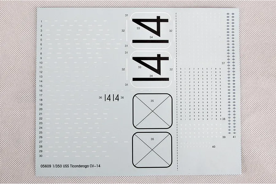 A decal sheet for the Trumpeter 1/350 scale USS Ticonderoga CV-14 model kit, featuring ship identification numbers, deck markings, and reference numbers.