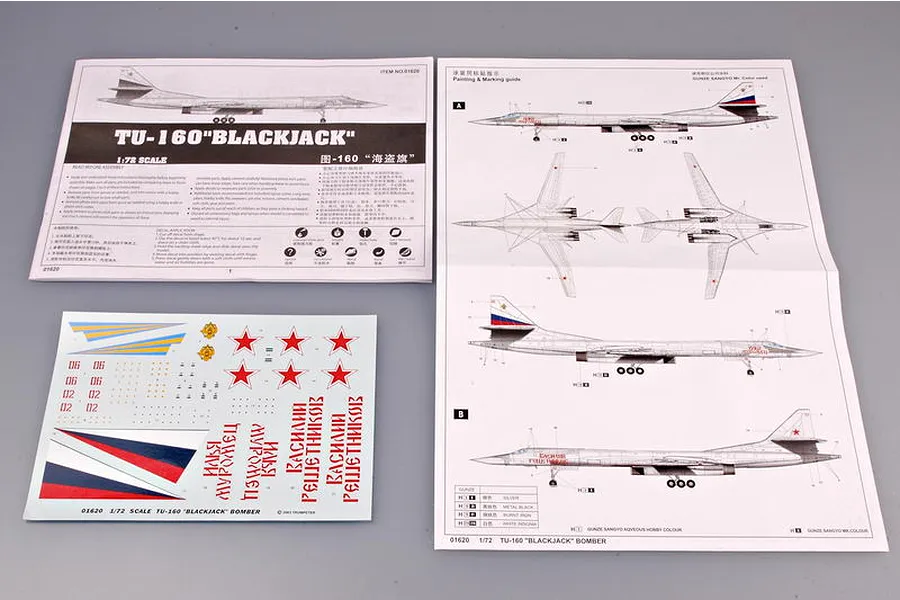 Instruction manual and decal sheet for the Trumpeter 1/72 scale TU-160 Blackjack model kit, displayed on a grey surface.