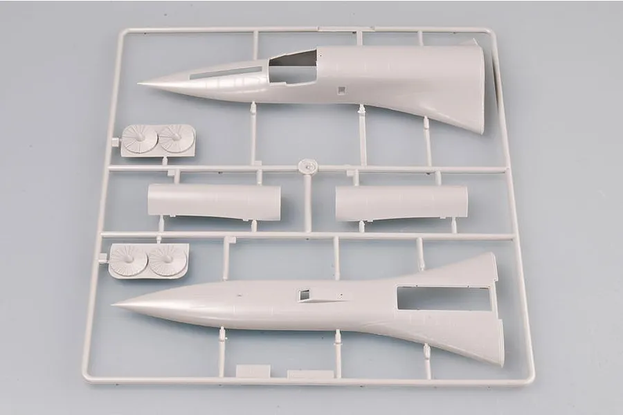 A grey plastic sprue containing fuselage and engine intake parts for a 1/72 scale model aircraft kit.