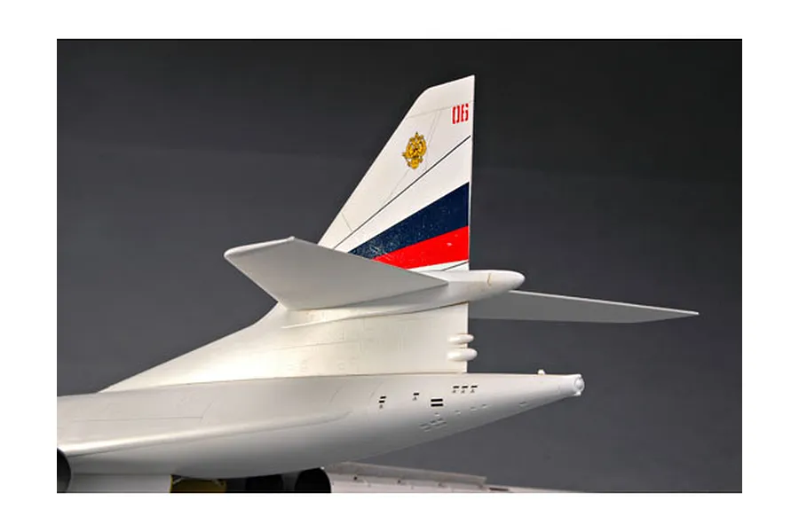 Close-up of the tail section of a 1/72 scale Trumpeter TU-160 Blackjack model aircraft, showing the vertical stabilizer with Russian Air Force markings.