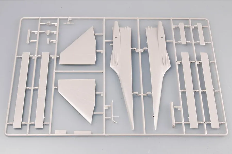 A grey plastic model kit sprue containing various aircraft wing and fuselage components for a 1/72 scale model.