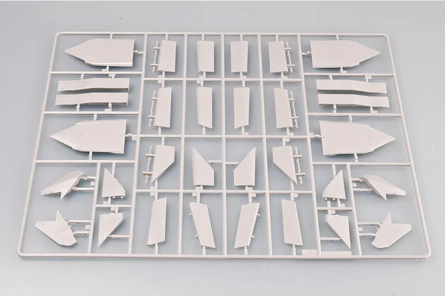 A grey plastic model kit sprue containing various aircraft wing and fuselage components for a 1/72 scale model.