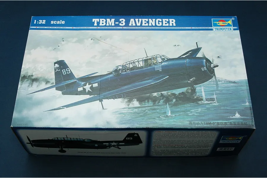 The box art for a Trumpeter 1/32 scale TBM-3 Avenger plastic model kit, featuring an illustration of the aircraft flying over the ocean.