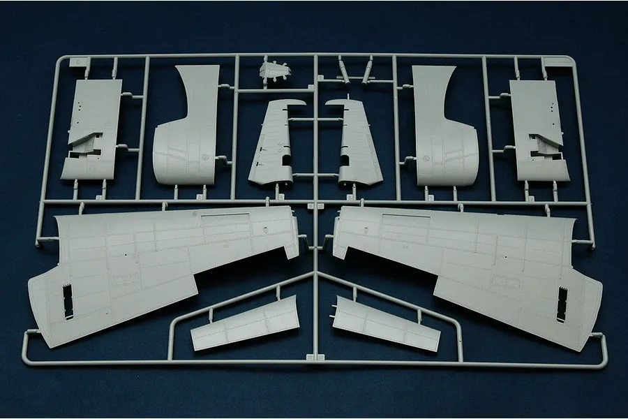 A grey plastic model aircraft sprue containing wing and fuselage parts for a 1/32 scale TBM-3 Avenger model kit.