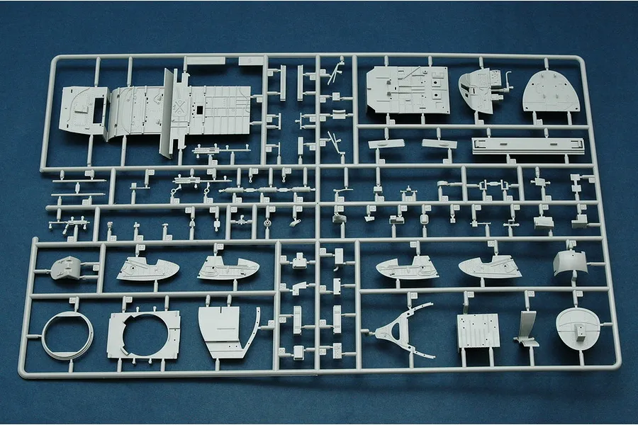 A grey plastic sprue containing various unpainted model aircraft parts for a 1/32 scale TBM-3 Avenger bomber kit.