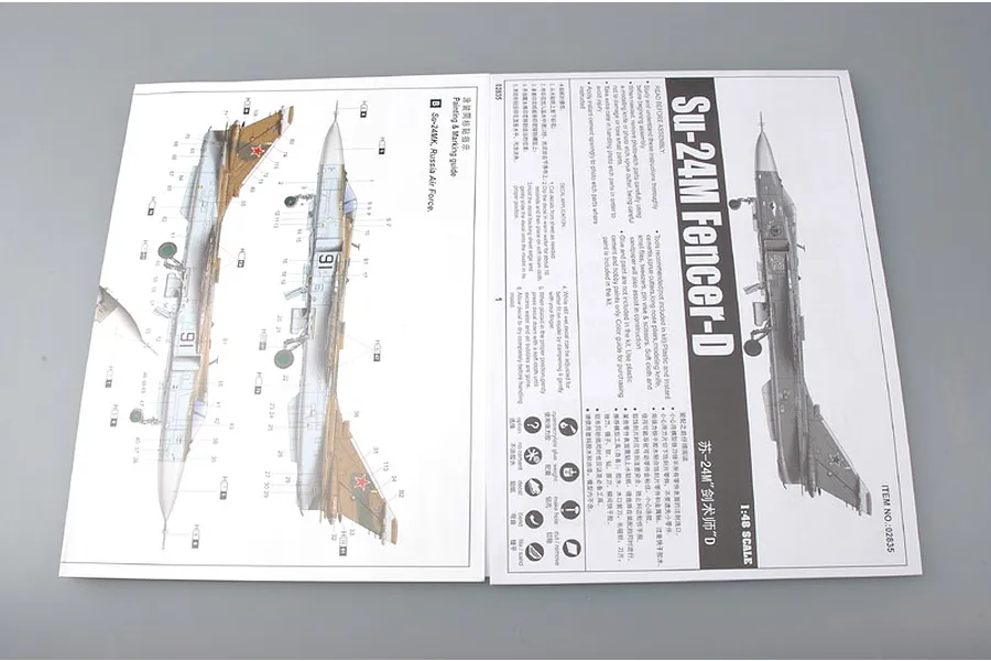 Open instruction manual for Trumpeter 1/48 Su-24M Fencer-D model kit showing assembly and painting guides.