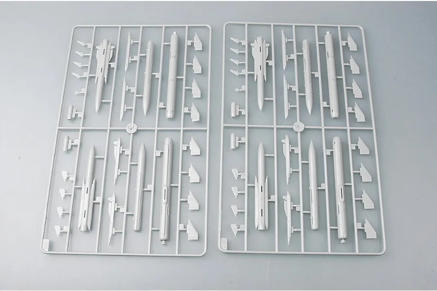 Two identical grey plastic model kit sprues containing various missile and weapon components for a 1/48 scale aircraft model.