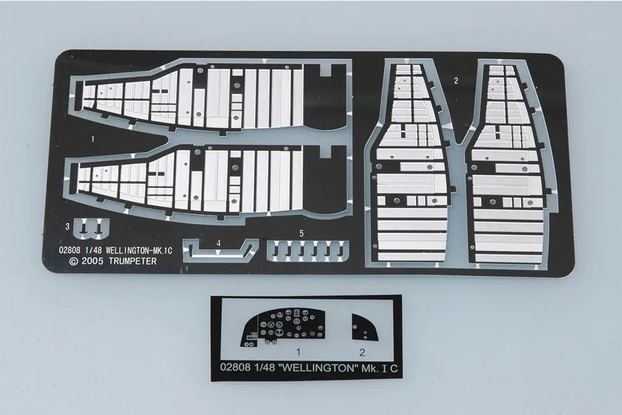 Photo-etched metal detail parts for a 1/48 scale Trumpeter Wellington Mk. IC model kit, including interior structural panels and instrument panel.
