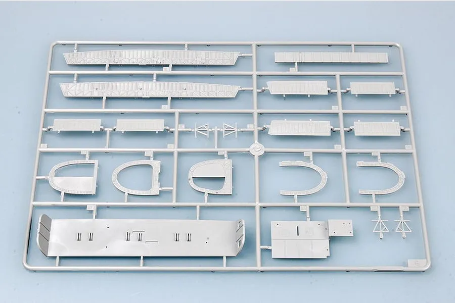 A grey plastic model kit sprue containing various aircraft wing and fuselage components for a 1/48 scale model.