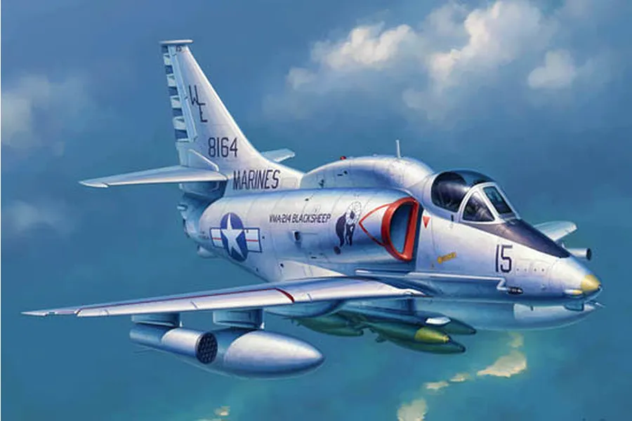 Box art illustration of a US Marines A-4M Skyhawk jet aircraft flying through a cloudy blue sky.