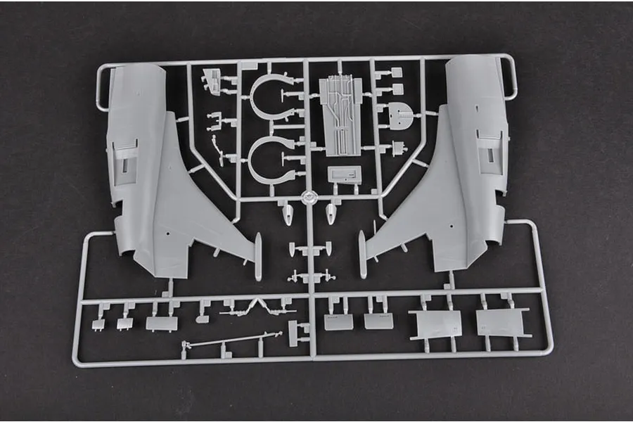 A grey plastic sprue containing model aircraft parts, including two large wing sections, for a 1/32 scale A-4M Skyhawk model kit.