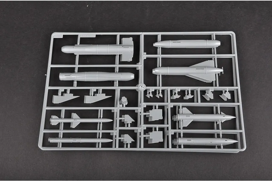 A grey plastic sprue containing various model aircraft weapon parts for a 1/32 scale A-4M Skyhawk kit.