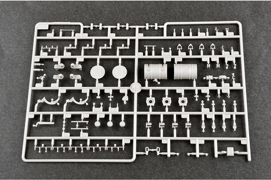 A grey plastic sprue containing various unpainted model parts for a 1/35 scale military vehicle kit.