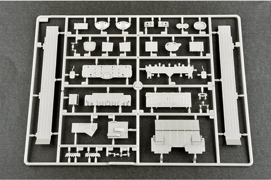 A light grey plastic sprue containing various unpainted model tank parts for a 1/35 scale Trumpeter BMPT-72 kit.