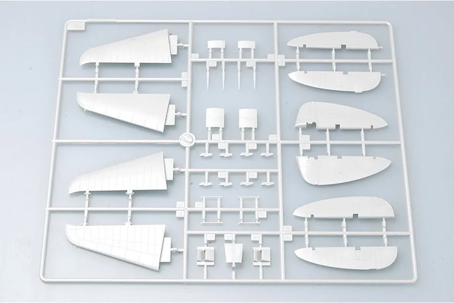 A grey plastic model aircraft sprue containing wing and tail components for a 1/32 scale P-47 Thunderbolt model kit.