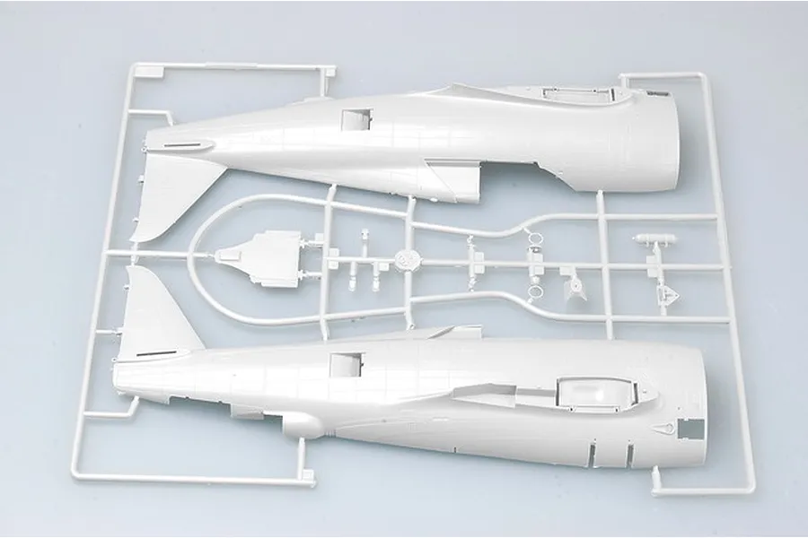 A plastic model kit sprue containing two fuselage halves for a 1/32 scale P-47 Thunderbolt model aircraft.