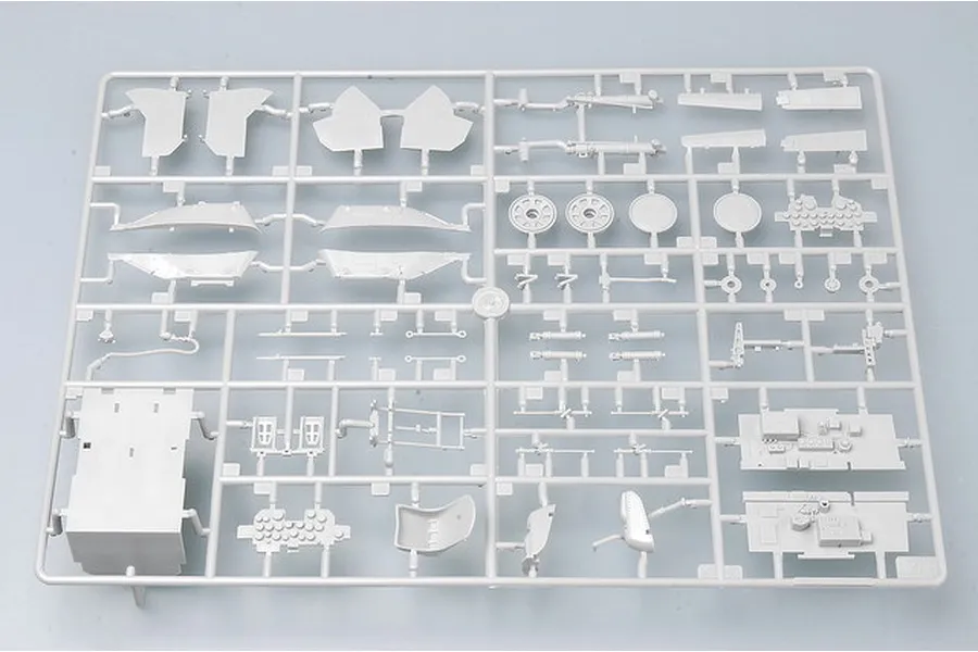 A grey plastic sprue containing various unpainted model aircraft parts for a 1/32 scale P-47 Thunderbolt model kit.