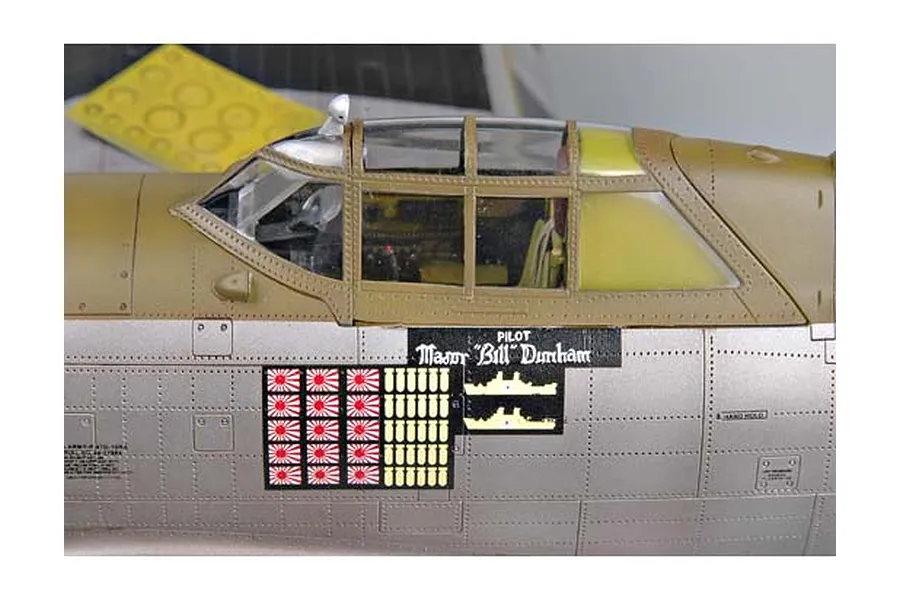 Close-up of a 1/32 scale P-47 Thunderbolt model cockpit showing pilot name Major Bill Dunham and kill markings on the fuselage.