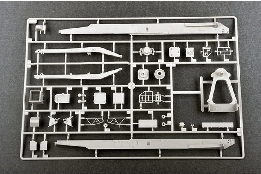 A grey plastic model kit sprue containing various structural components for a 1/35 scale military vehicle model.