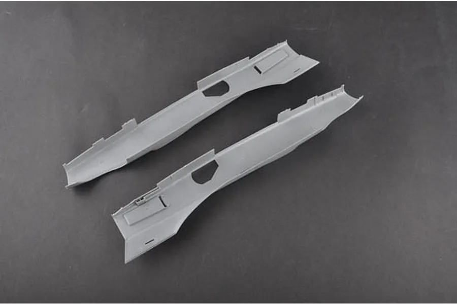 Two grey plastic model aircraft fuselage halves from a Trumpeter 1/48 A-3D-2 Skywarrior kit.