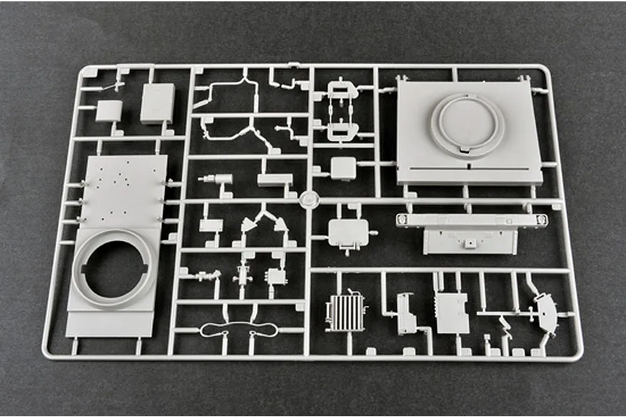 A grey plastic sprue containing various model parts for the Trumpeter 1/35 Mobile Artillery Rocket System kit.