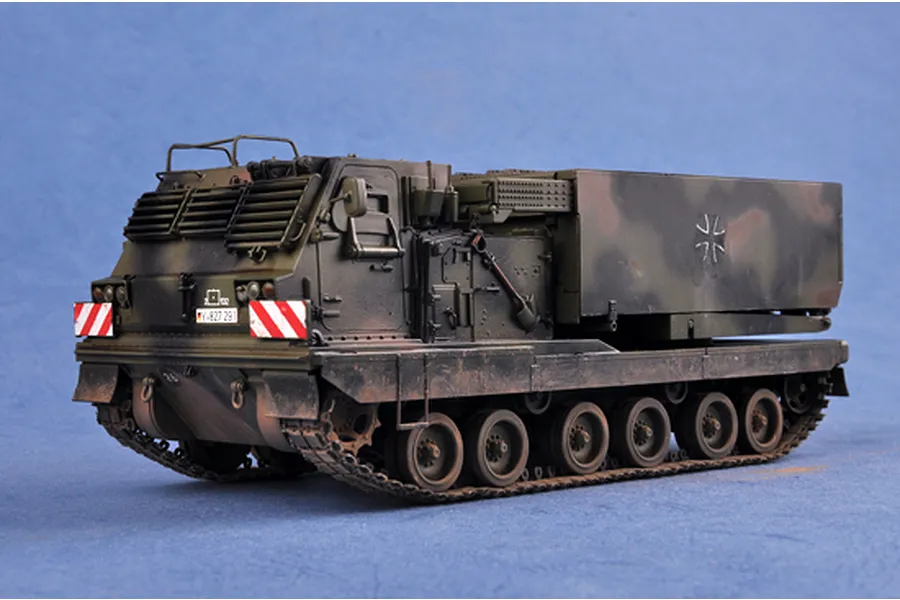 A 1/35 scale model of a German MARS multiple launch rocket system vehicle, painted in camouflage, viewed from a front-three-quarter angle.