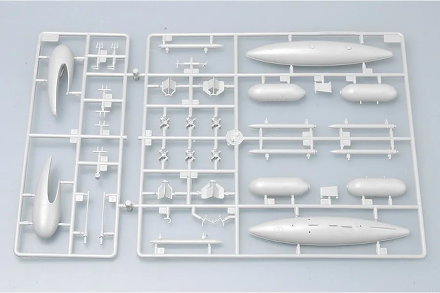 A grey plastic sprue from a Trumpeter 1/32 scale model kit containing various aircraft parts including fuel tanks and missiles.