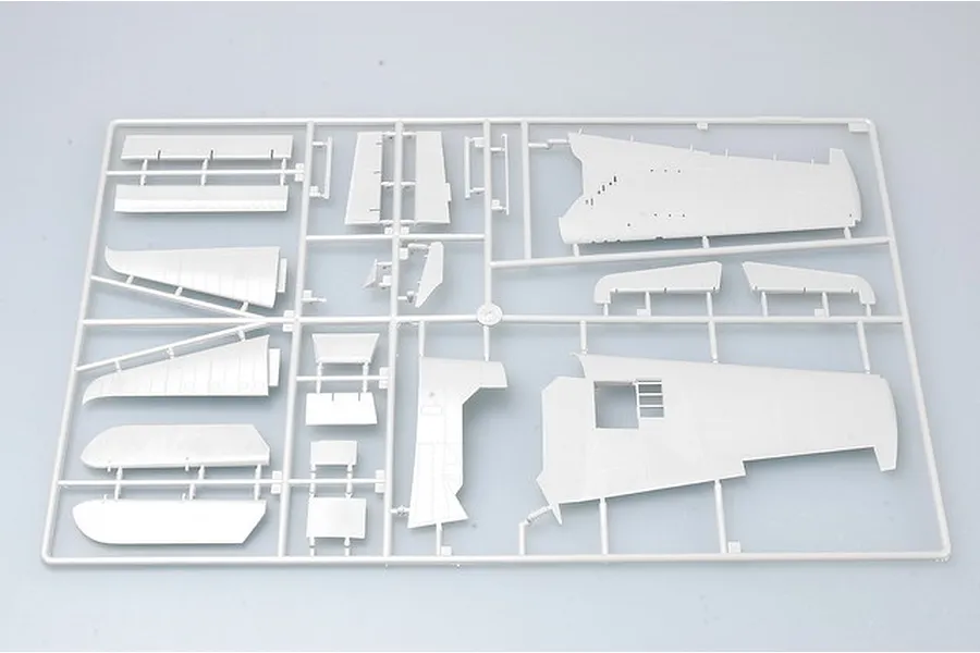 A grey plastic model aircraft sprue containing various wing and tail components for a 1/32 scale model kit.