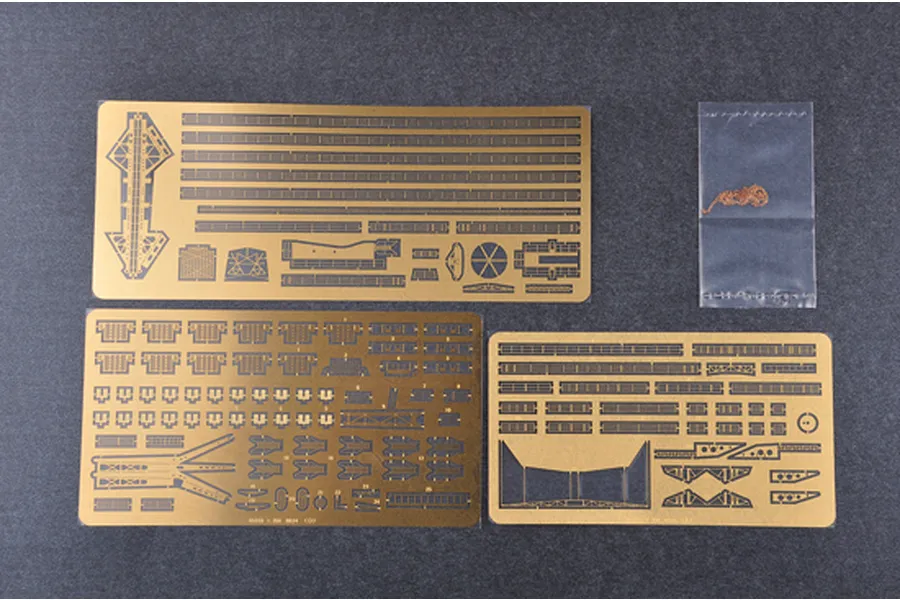 Three photo-etched metal detail sheets and a small bag of chain for a 1/350 scale USS New York model kit.