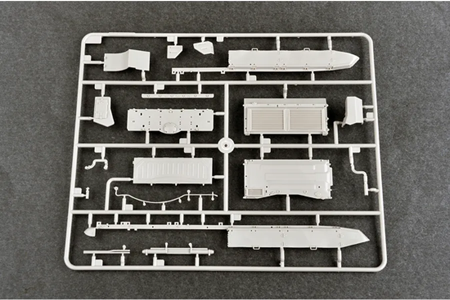A plastic model kit sprue containing various grey tank hull and engine deck parts for a 1/35 scale model.