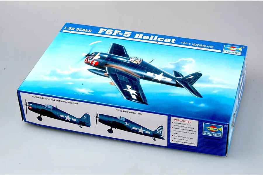 Trumpeter 1/32 scale F6F-5 Hellcat plastic model kit box featuring artwork of the aircraft in flight.