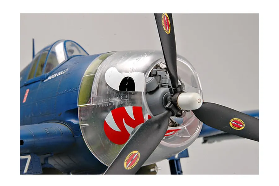 Close-up of a 1/32 scale Trumpeter F6F-5 Hellcat model aircraft showing the nose, propeller, and cockpit area.