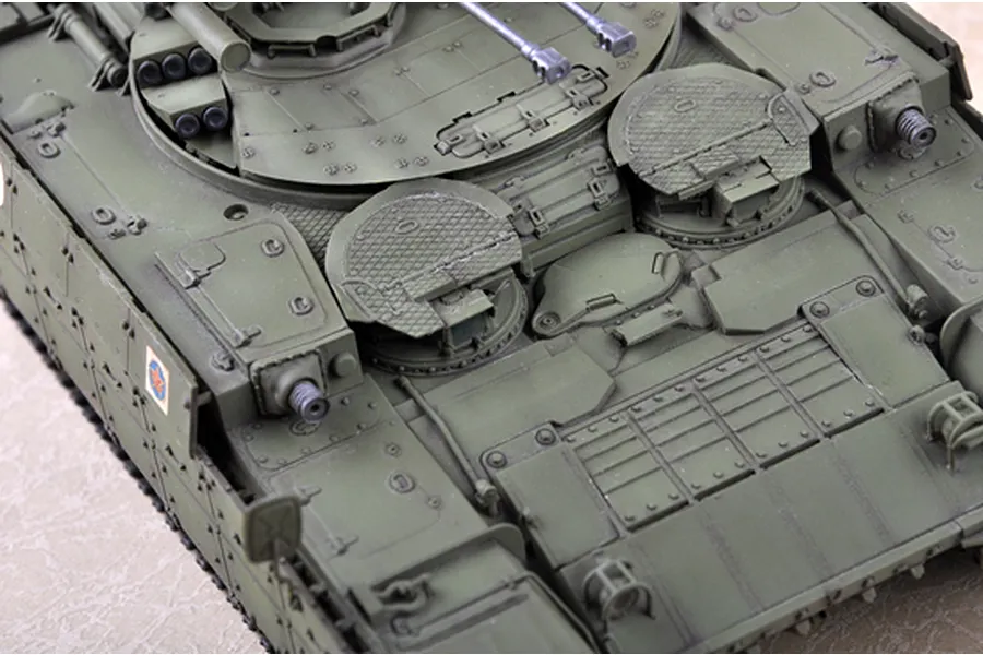 Top-down view of a 1/35 scale plastic model of a BMPT Terminator tank, showing the turret, hatches, and olive green hull detail.