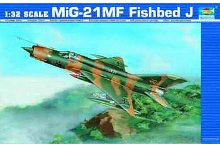 Box art for a Trumpeter 1/32 scale MiG-21MF Fishbed J model kit featuring a camouflaged fighter jet flying over a landscape.