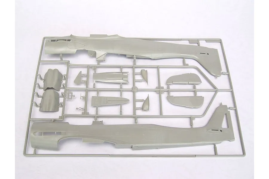 A grey plastic sprue containing fuselage halves and smaller aircraft model parts for a 1/24 scale Focke-Wulf Fw 190 model kit.