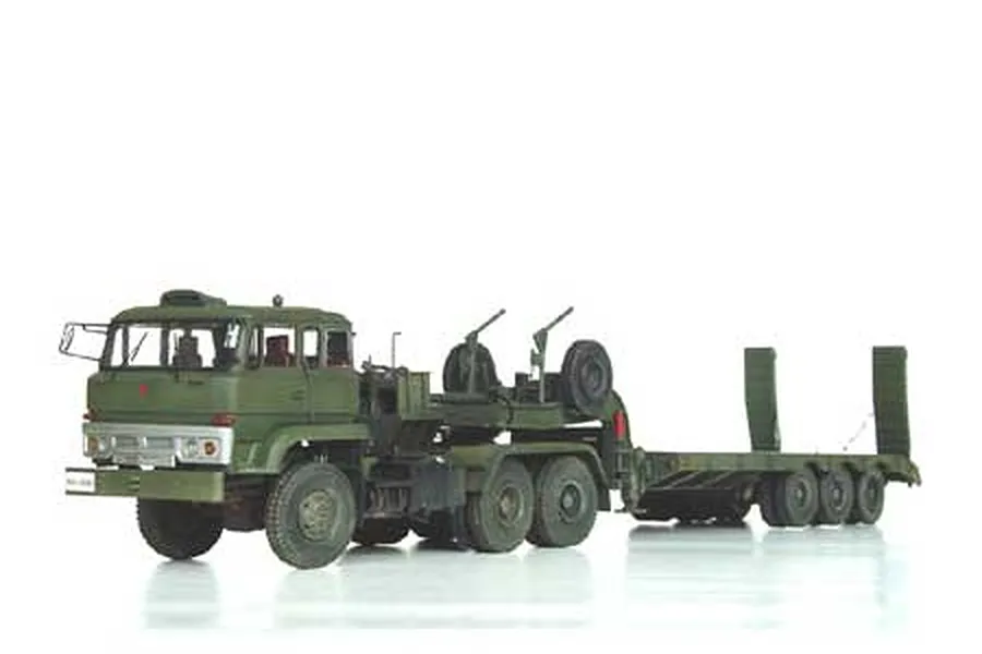 A 1/35 scale plastic model of a Chinese 50-ton tank transporter truck, painted in olive green military camouflage on a white background.