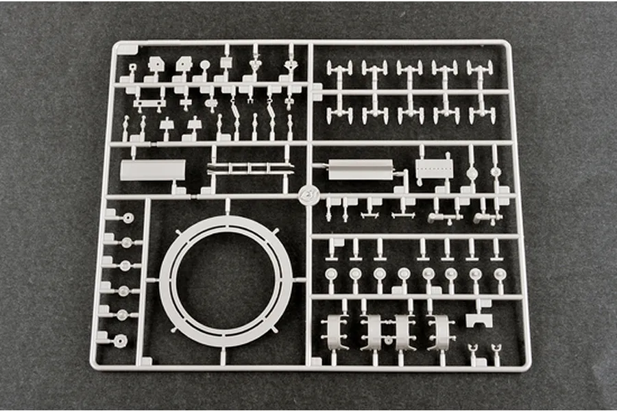 A grey plastic sprue containing various small model parts for the Trumpeter 1/35 BTM-3 High Speed Trench Digger kit.