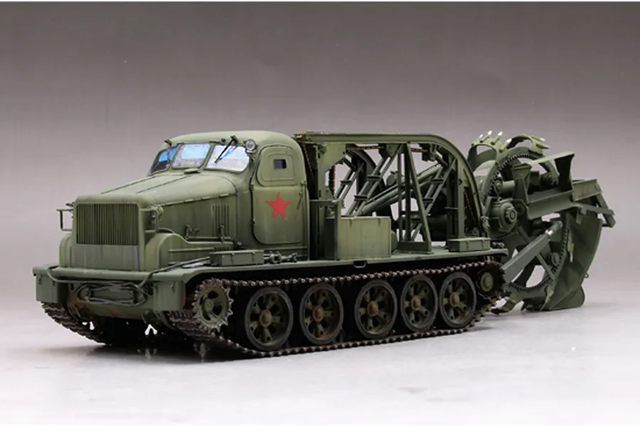 A 1/35 scale model of a BTM-3 high-speed trench digger vehicle, painted in olive green with a red star emblem on the side.