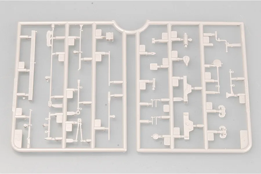 A light grey plastic sprue containing various small model tank parts for a 1/35 scale Trumpeter kit.
